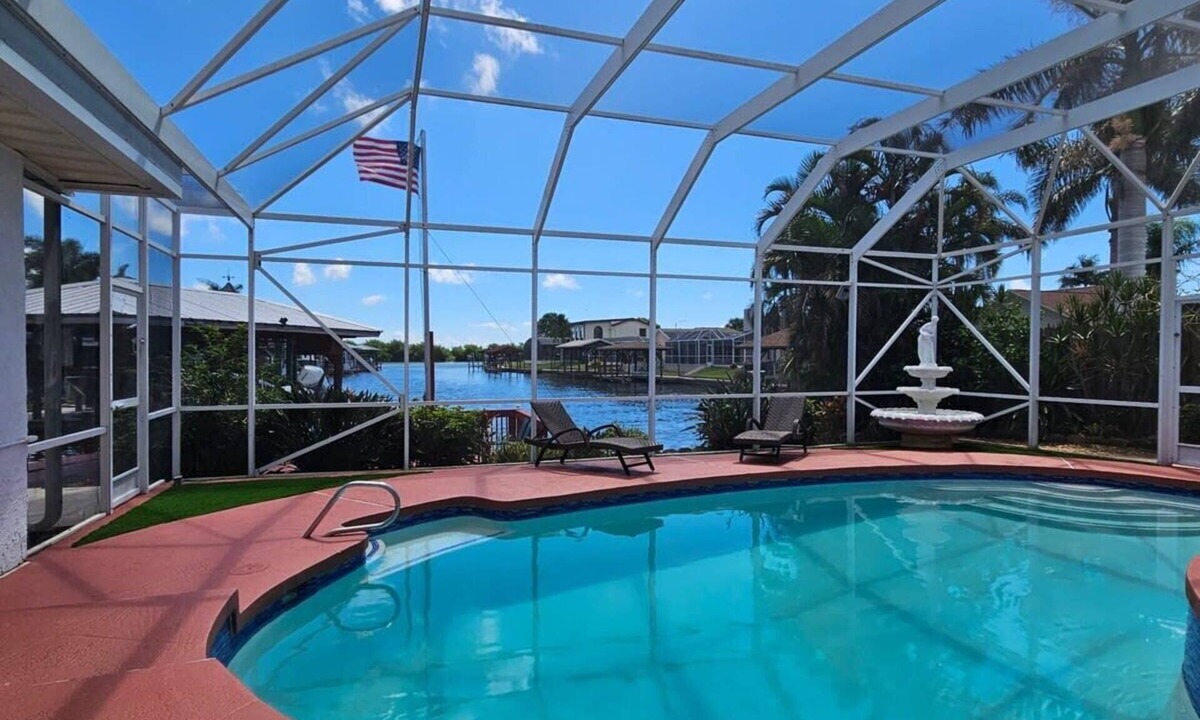 Villa De Palmas House | Cozy Riverfront Home with Pool