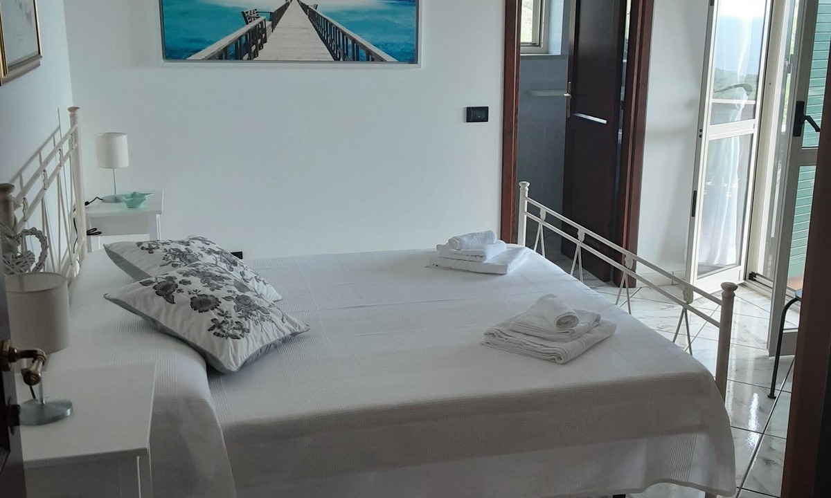 Marina Di Camerota Apartment | Double room with bathroom, small terrace with sea view