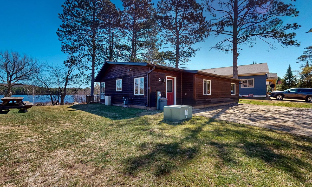 Three Lakes House | Lakefront home with amazing views, WFH desk, canoe, kayaks & private dock