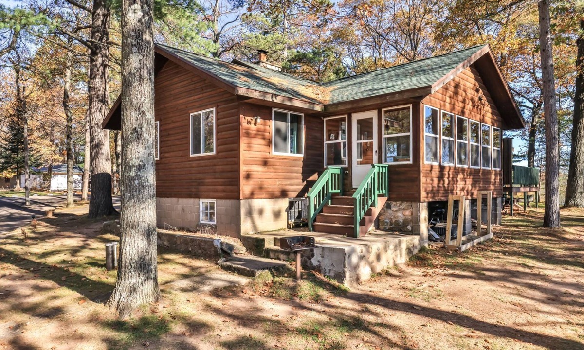 St Germain Cabin | Lakeside resort cabin right on Little Saint with dock, sandy beach, firepit!