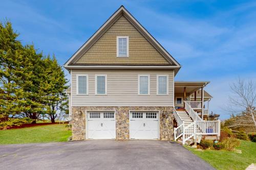 Livingston House | Nature lover's lakefront home with a beach, dock, fire ring, & more