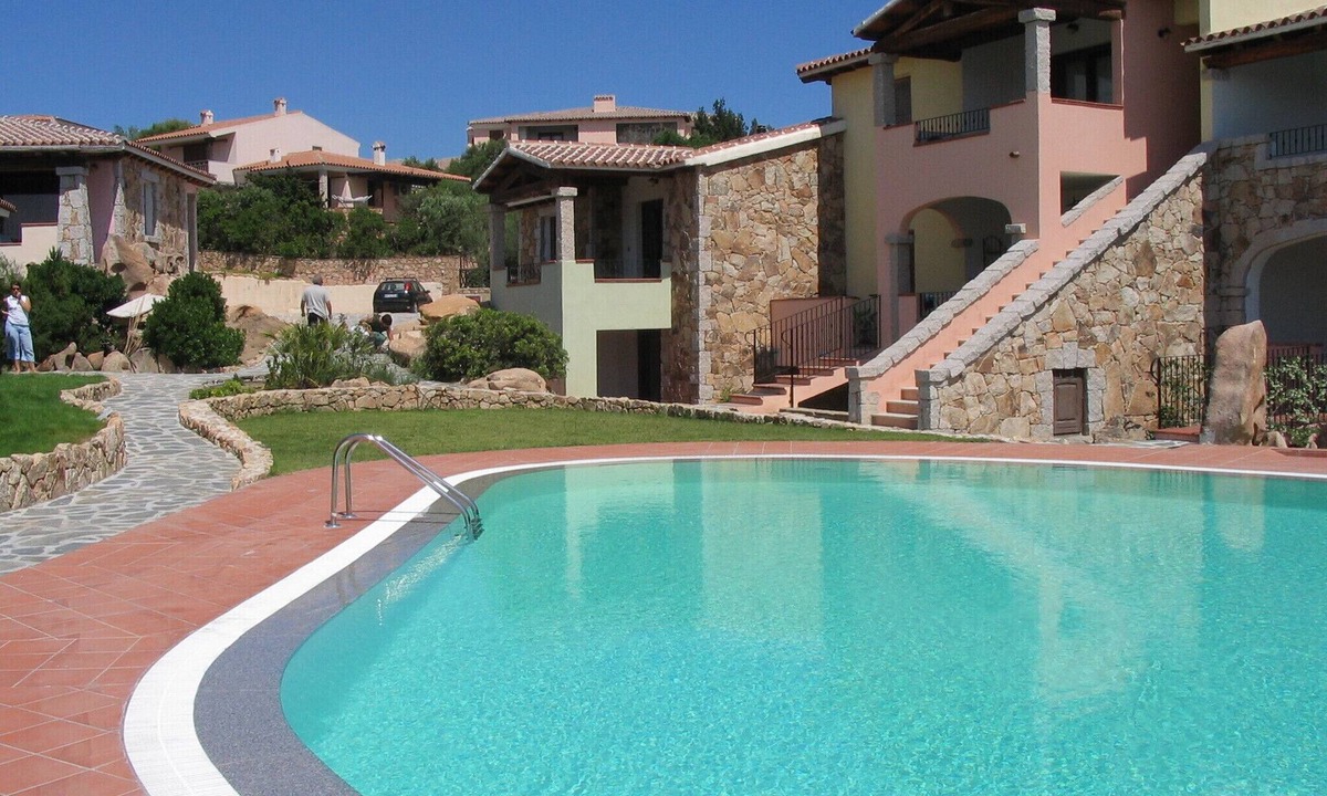 Monte Petrosu Apartment | Nice apartment with roof terrace in an elegant complex with swimming pool