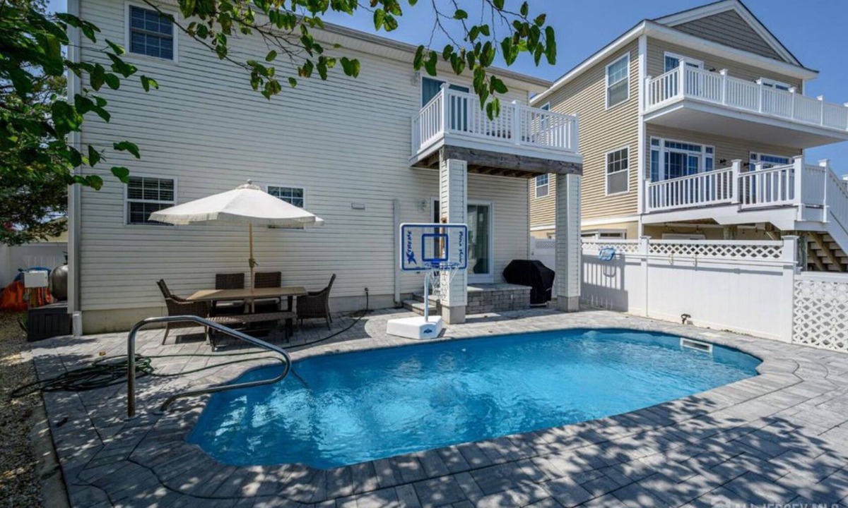 Beach Haven West House | Pet friendly 3-bedroom house with saltwater heated pool. EV charger.
