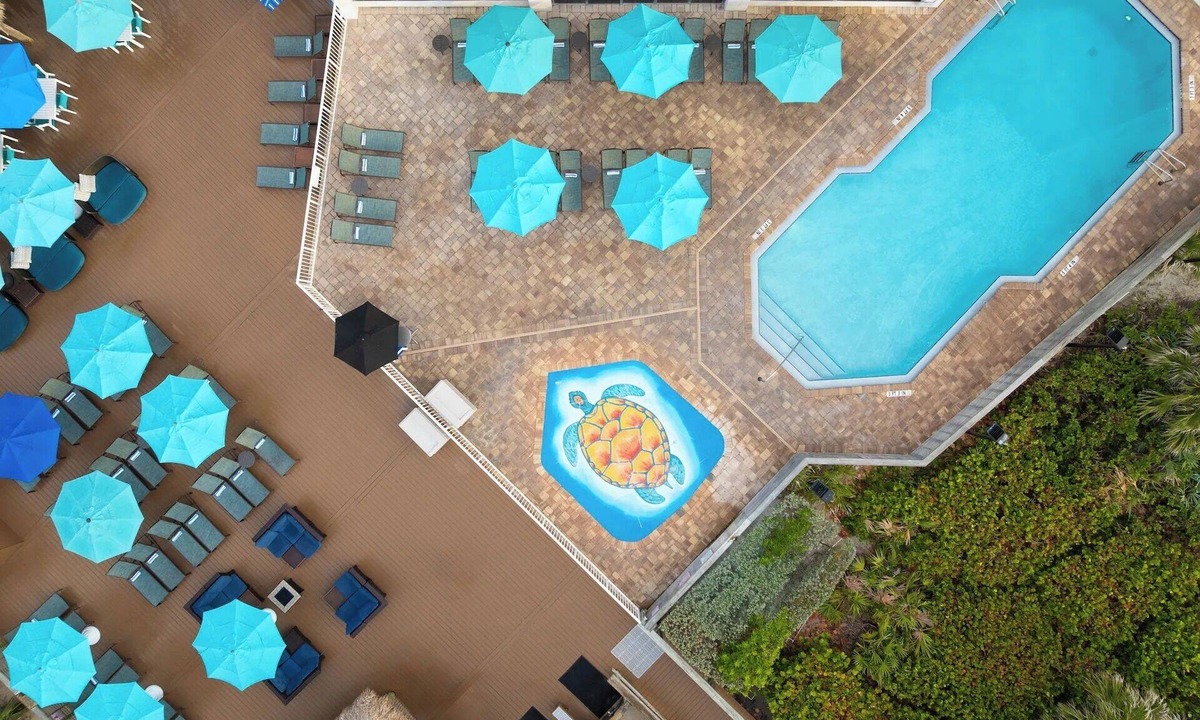 Cocoa Beach Hotel | Seaside Symphony | Heated Pool + Beach Bar | 1.7 mi to Alan Shepard Beach Park