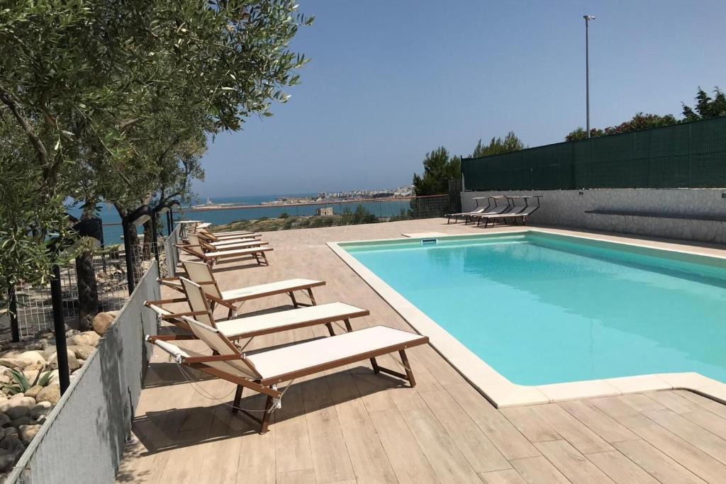 Defensola Apartment | Stella Marina with Pool 100 m from beach