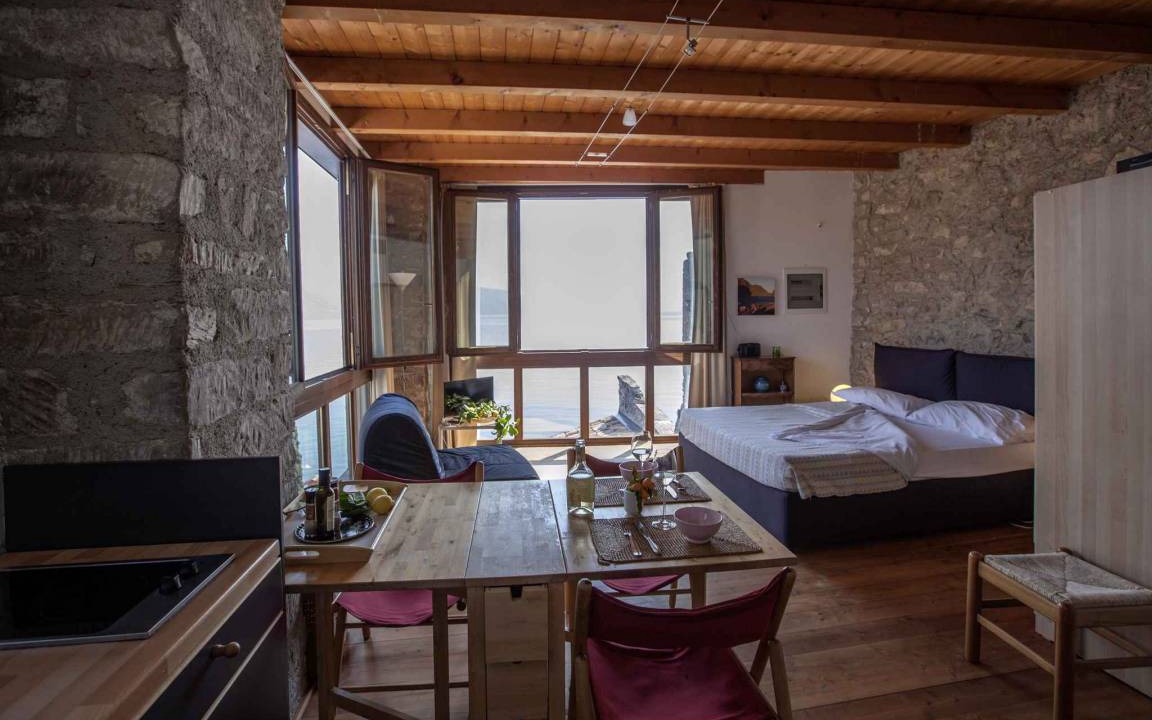 Tignale Apartment | Studio rustically furnished, overlooking lake and with terrace