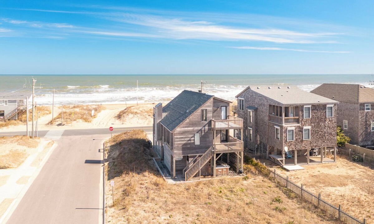 Colington House | Sun Realty pet-friendly semi-oceanfront home with incredible views!