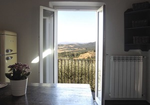 You face and touch the towers of San Giminignano