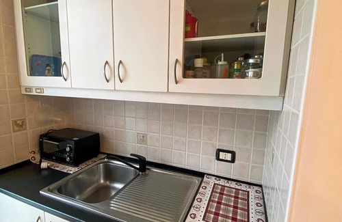 Montegrino Valtravaglia Apartment | 3½-zimmer-wohnung in Einer Gepflegten Residenz mit Pool und Tennisplatz
