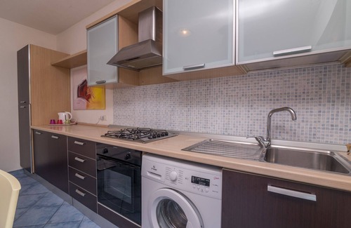 Santa Teresa di Gallura Apartment | Accessible Holiday Apartment 'Borgo Dei Mirti 15' with Terrace & 2 Pools