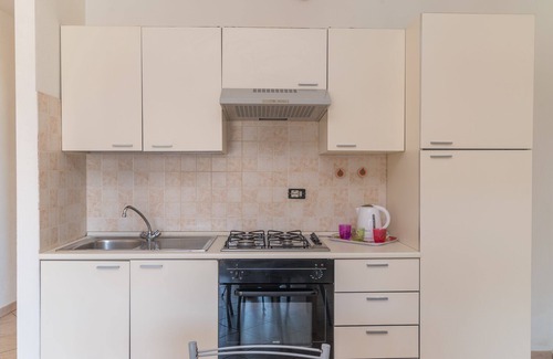 Santa Teresa di Gallura Apartment | Accessible Holiday Apartment 'Borgo Dei Mitri 27' with Garden, Terrace & 2 Pools