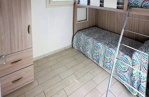 Badesi Apartment | Attic three-room apartment with panoramic sea view, shared swimming pool and parking space