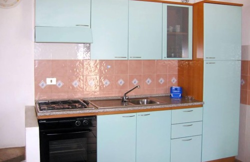 Tanaunella Apartment | Borgo Le Logge trilo (BUD112) by Interhome