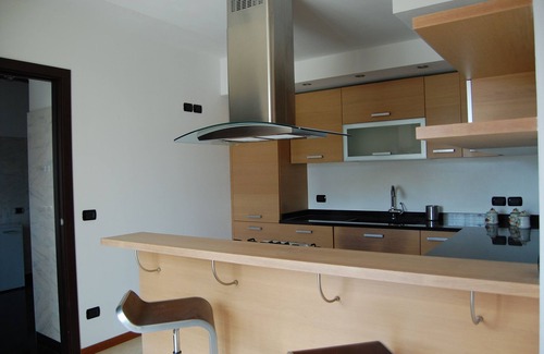 Nord-Ovest Apartment | Casa Are Junior. Two-room apartment with a large marble bathroom and a comfortable sofa bed.