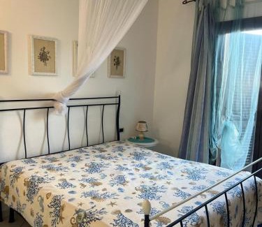 Porto Azzurro Apartment | FREE PARKING Pool with a sea view