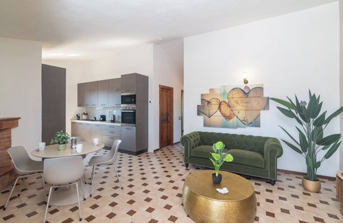 San Teodoro House | Holiday Home 'Rosmar' with Private Terrace, Shared Garden and Air Conditioning