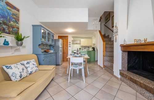 Porto Sa Ruxi House | Holiday Home "Villetta Anna a Porto Sa Ruxi" with Sea View, Shared Pool & Wi-Fi