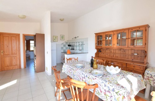 San Giovanni Apartment | Practical and rustic apartment with large terrace and sea view in San Giovanni di Posada.