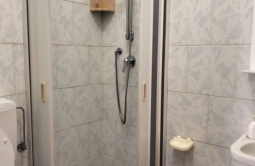 Lipari Historic Centre Apartment | single room with ceiling fan