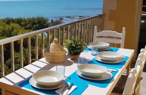 Caucana-finaiti-casuzze-finaiti Nord Apartment | Sitting on the beach