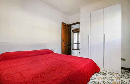 Villa Rosa Apartment | Spend a great vacation by the sea in this beachfront apartment.
