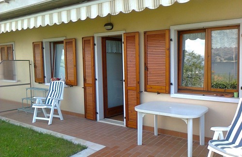 Assenza Apartment | Wonderful lake view with private garden and pool among olive trees