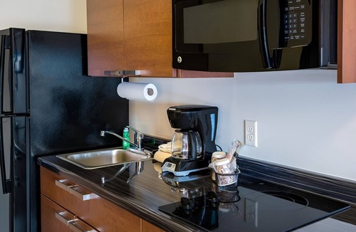 Council Bluffs Hotel | 3 Fully Equipped Studios with Pool Great for Family Fun in Council Bluffs Area