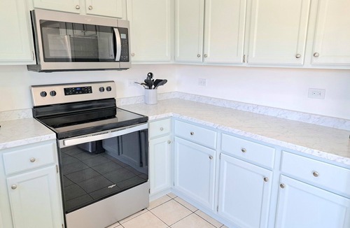 Roselle Apartment | 32+ Night Stay 2BR Condo Walk to Train