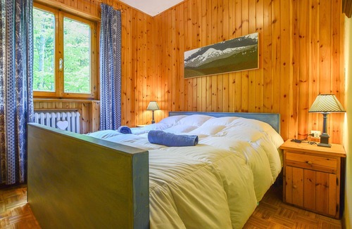 Abetone Apartment | A lot of wood and a lot of nature.