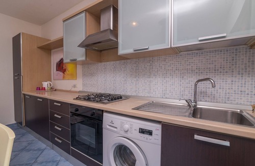 Santa Teresa di Gallura Apartment | Accessible Holiday Apartment 'Borgo Dei Mirti 15' with Terrace & 2 Pools