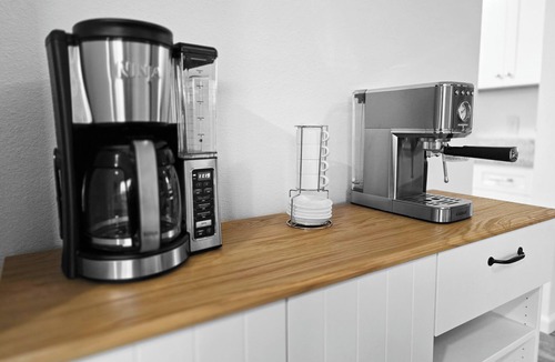 Interchange Square House | Accessible Palm Bay Escape Arcade Coffee Bar Wi-Fi Work Space Roll-in Shower