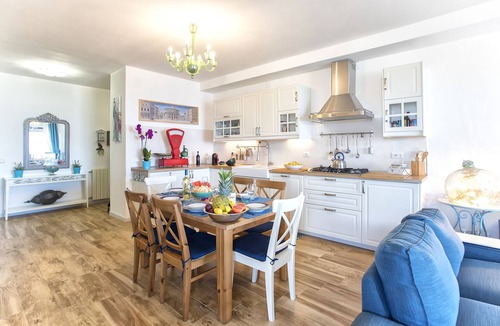 Alghero Apartment | Alghero on the sea. Penthouse with incredible view and covered verandas for 9 people