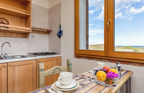 San Teodoro Apartment | Apartment "Cala Brandinchi" with Sea View, Private Terrace and Shared Pool