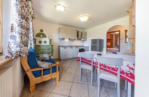 Vigo di Fassa Apartment | Apartment "Ciasa Sommavilla Calendula" with Mountain View, Shared Garden & Wi-Fi