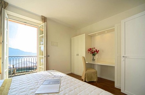 Meina Apartment | Apartment in Meinein with balcony