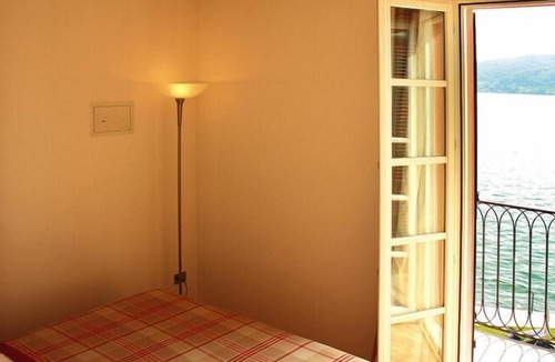 Meina Apartment | Apartment in Meinein with balcony