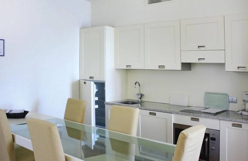 Meina Apartment | Apartment in Meinein with balcony