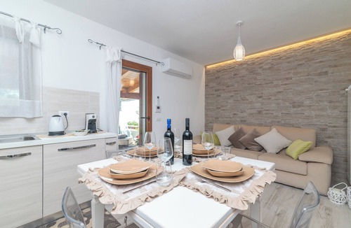 Santa Teresa di Gallura Apartment | Apartment 'Trilo Nina' with Private Terrace, Private Garden and Air Conditioning