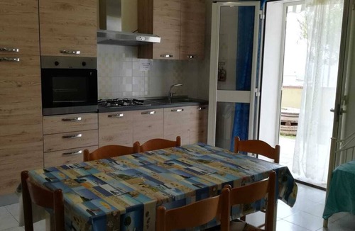 Badesi Apartment | APARTMENT WITH VERANDA AND GARDEN + FERRY UNDER COST