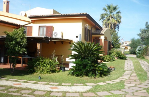 Arbatax Villa | arbatax tortoli: elegant and prestigious villa with green lawn and flowers