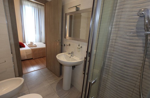 Esquilino Bed & Breakfast | Aria Rome Rooms double room with balcony and view of Basilica di San Giovanni