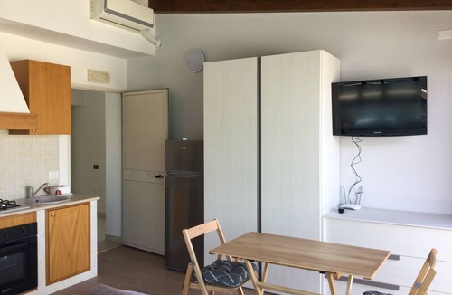 Pozzallo Apartment | Attic, stylishly furnished, large terrace and sea view, 5 min. to the beach.