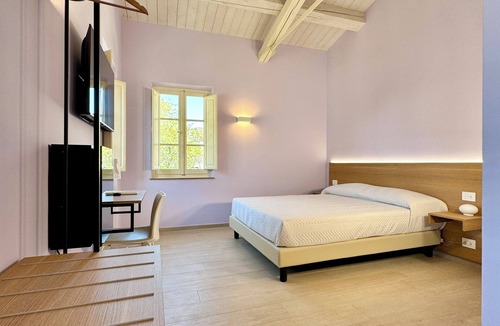 Falerone Bed & Breakfast | B&B Casa Castelli-Elegant Art Nouveau villa with garden in front of Roman theater