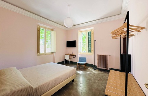 Falerone Bed & Breakfast | B&B Casa Castelli-Elegant Art Nouveau villa with garden in front of Roman theater