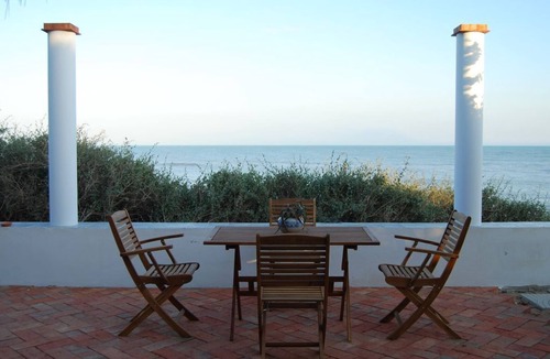 Caucana-finaiti-casuzze-finaiti Nord House | Blue House: terrace and veranda overlooking the sea from the garden. Beach access from home