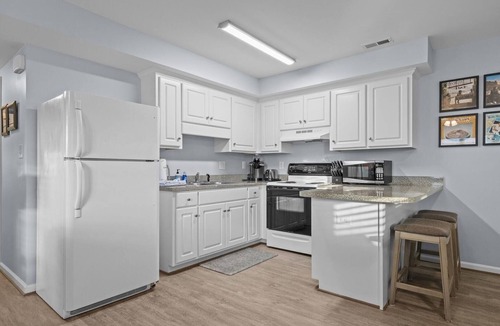 Atlantic Beach Condo | Boardwalk Shores B 2 Bedroom Duplex by RedAwning