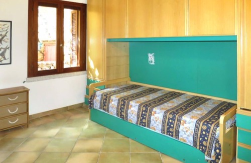 Tanaunella Apartment | Borgo Le Logge + pool (BUD117) by Interhome