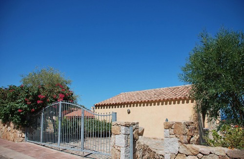 Porto San Paolo Apartment | Bouganville apartment on villa with garden facing Tavolara Island