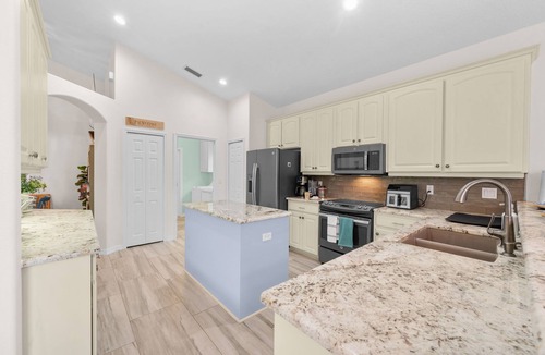Palm Harbor House | Canalfront w/Pool, Hot Tub, Movie Screen & Bunks