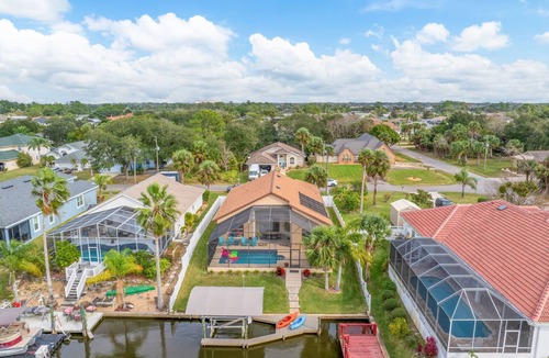 Palm Harbor House | Canalfront w/Pool, Hot Tub, Movie Screen & Bunks